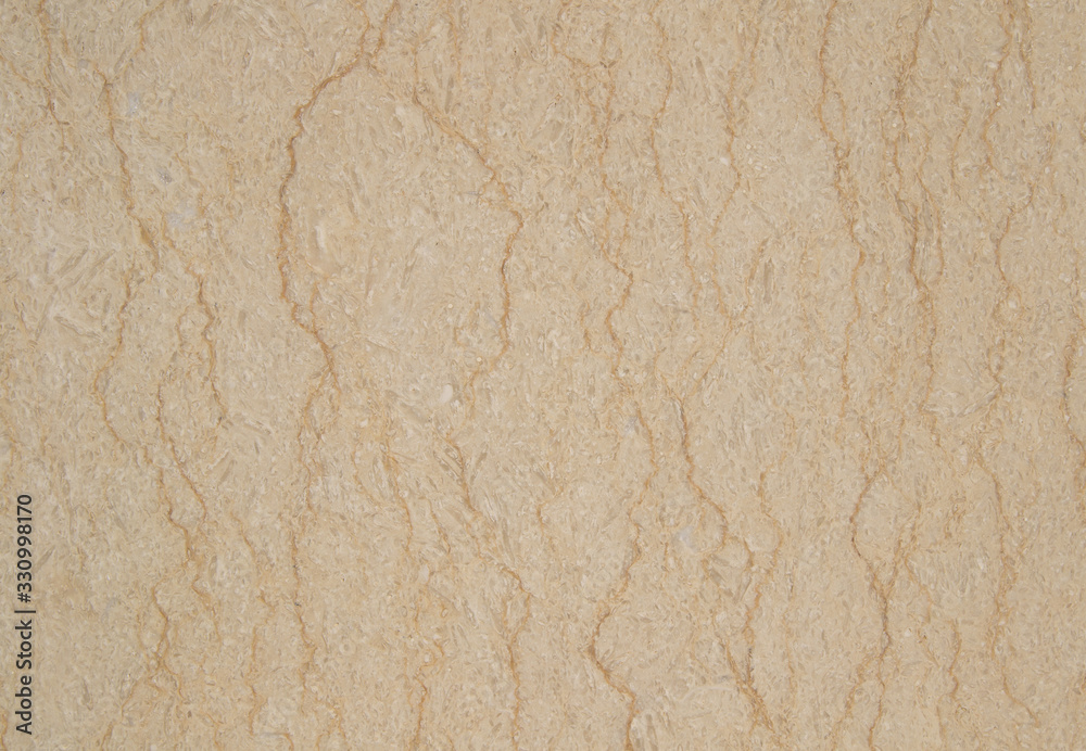 The texture of beige marble with vertical curved stripes. Granite of color of baked milk with gyrus. Not an ordinary background. The texture of beige marble with vertical curved stripes. Granite of color of baked milk with gyrus. Not an ordinary background.