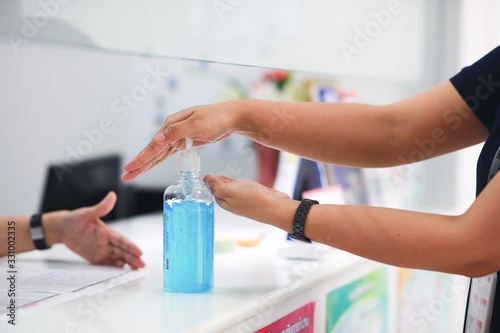 Hand pushing or pumping algohol gel for wash   cleaning hands from virus  bacteria  for good hygiene stock photo