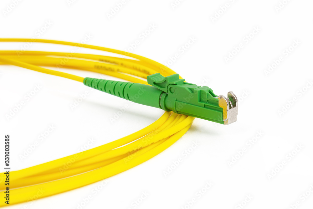 fiber optic single mode patch cord E2000 LSH connector isolated on white fiber optic single mode patch cord E2000 LSH connector isolated on white