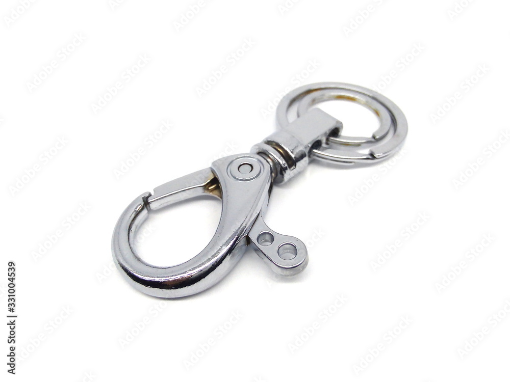 Close up of key chain or key ring isolated on white background. Alloy keychain. Chrome color keyring. Close up of key chain or key ring isolated on white background. Alloy keychain. Chrome color keyring.