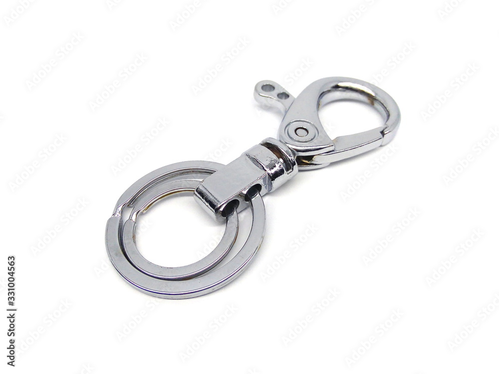 Close up of key chain or key ring isolated on white background. Alloy keychain. Chrome color keyring. Close up of key chain or key ring isolated on white background. Alloy keychain. Chrome color keyring.