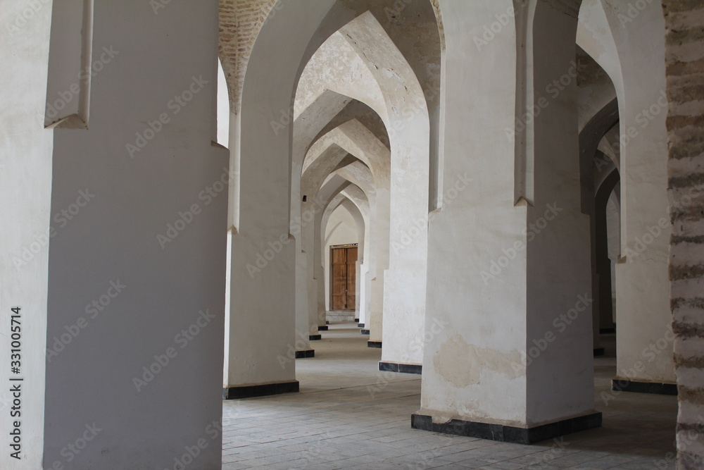 SAMARKAND, UZBEKISTAN-NOVEMBER 2019: columns of one of the madrassas