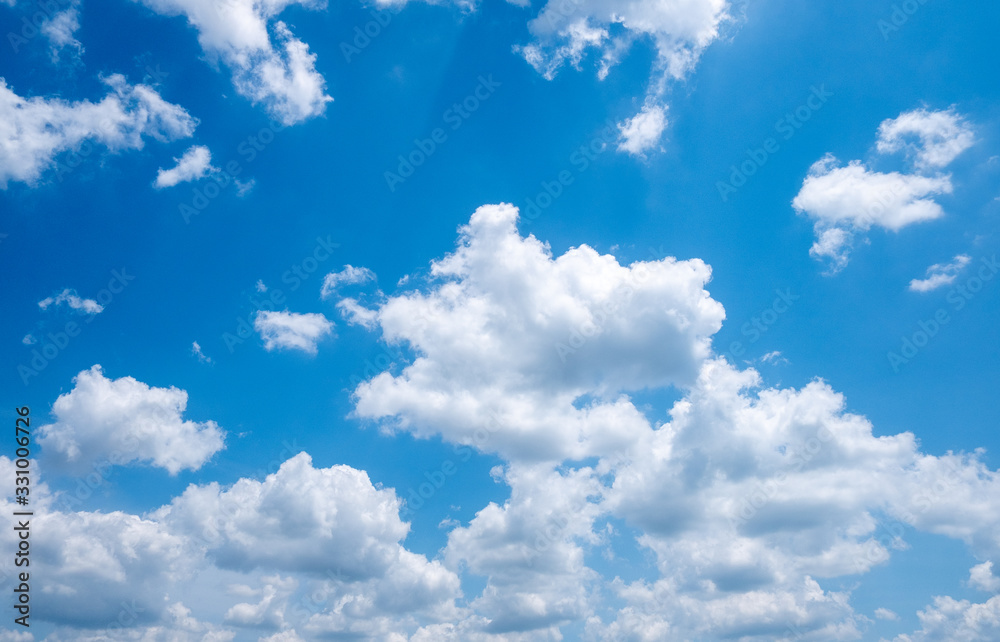 Clear blue sky and white clouds summer background Clear blue sky and white clouds summer background