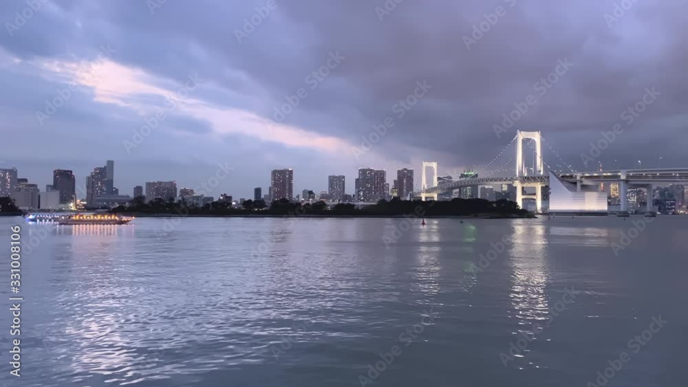 The view of the long bridge across the river in Tokyo Japan The view of the long bridge across the river in Tokyo Japan