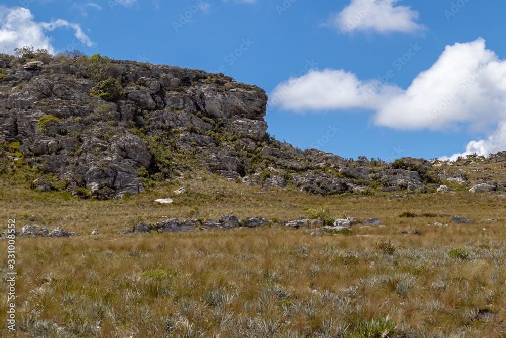 Rock formations, hills and vegetation of rupestrian fields, where their diversity is very high and many species are found, Serra do Cipó, Santana do Riacho, Minas Gerais, Brazil