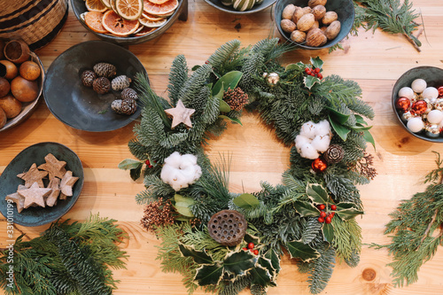 Christmas decorations. Christmas wreath. Florist made Christmas wreath. Details of Christmas wreath.