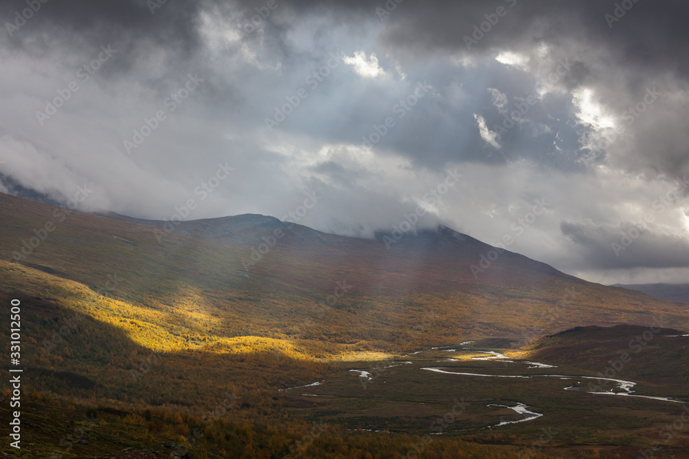 Impressive view of the mountains of Sarek national park in Swedish Lapland. selective focus