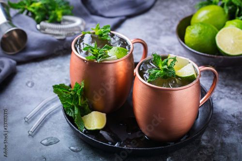 Classic Moscow mule cocktail with lime, mint and ice