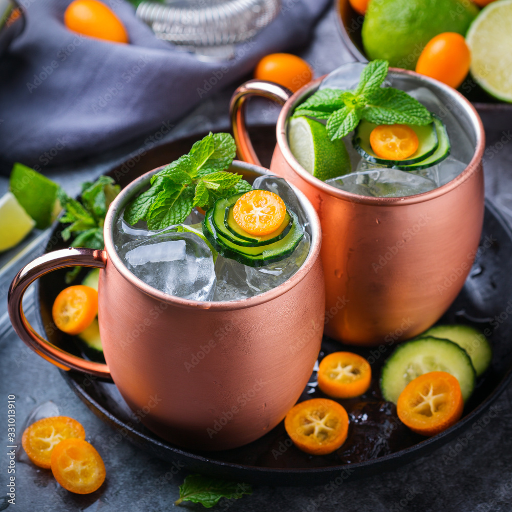 Moscow mule cocktail with lime, mint, cucumber and kumquat Moscow mule cocktail with lime, mint, cucumber and kumquat