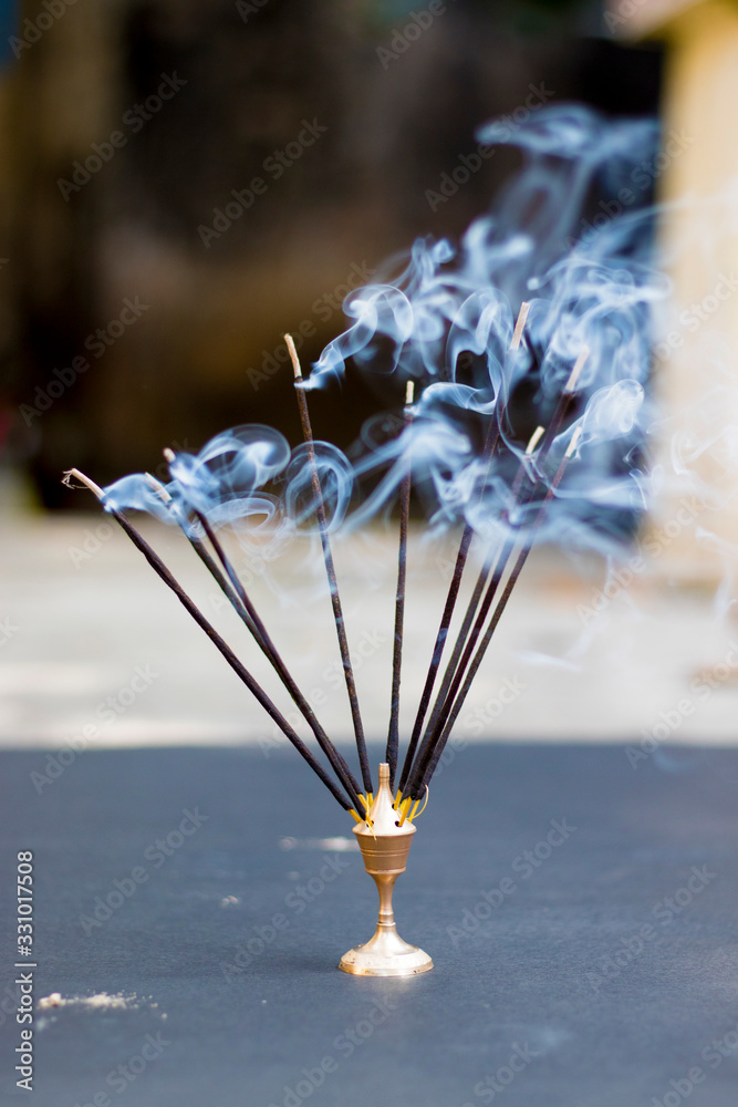 Incense Bamboo Stick with smoke,religious purpose.