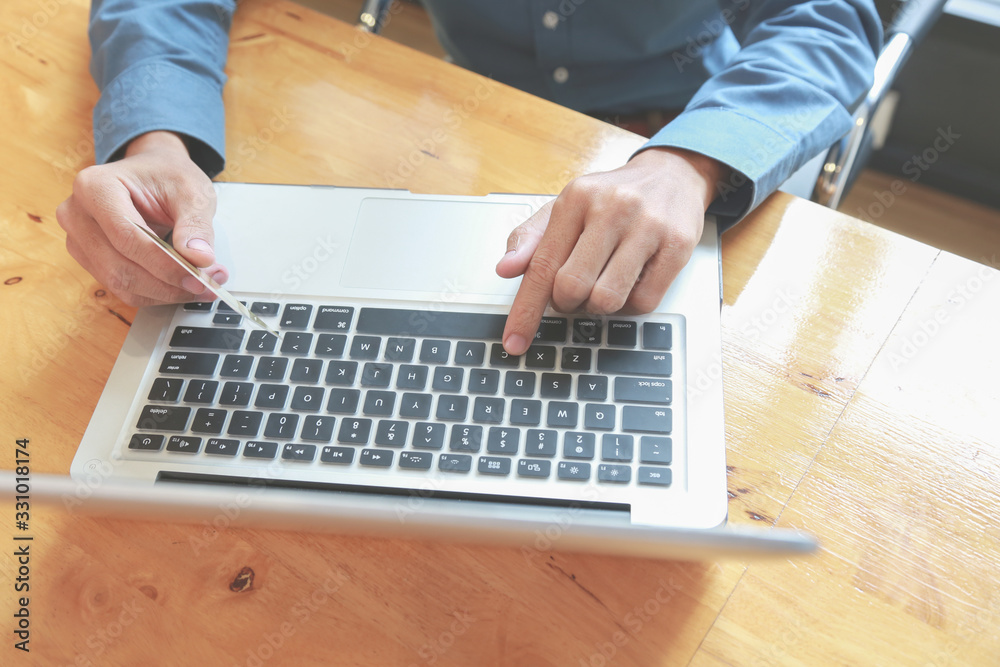 Business people are using their notebooks to find investment information. Business people are using their notebooks to find investment information.