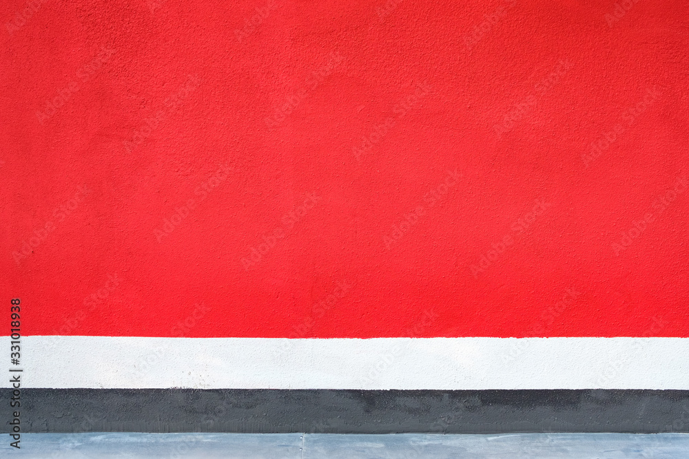 red wall with white and black stripes