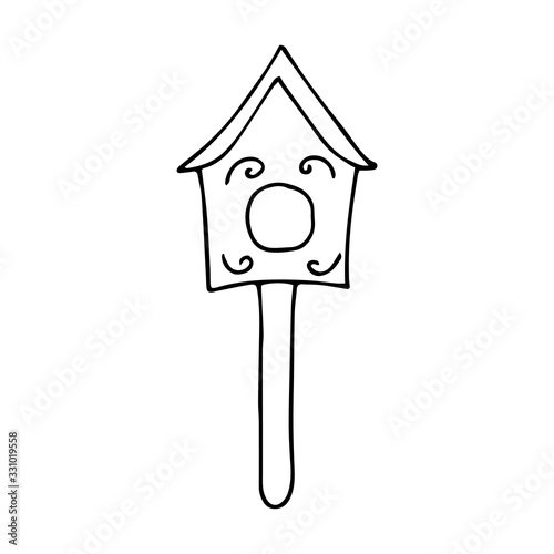 Cute wooden birdhouse. Black and white illustration on a white background in doodle style. Feeding trough for birds arriving from warm edges in the spring. Wooden building for the care of birds