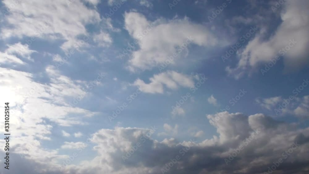 Time lapse as the white clouds pass, the blacks flood the sky Time lapse as the white clouds pass, the blacks flood the sky