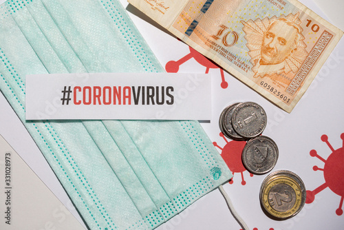 Corona virus impact on American economy and European economy crisis concept, banknotes with medical mask photo