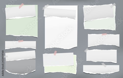 Torn of white and green note, notebook paper strips, pieces stuck on dark grey background. Vector illustration