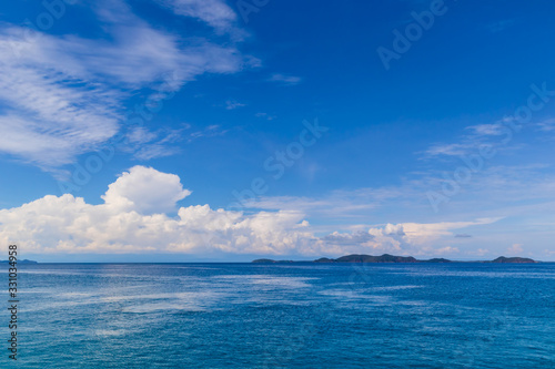 Blue sky with white cloud  and deep blue sea © Axl4Real