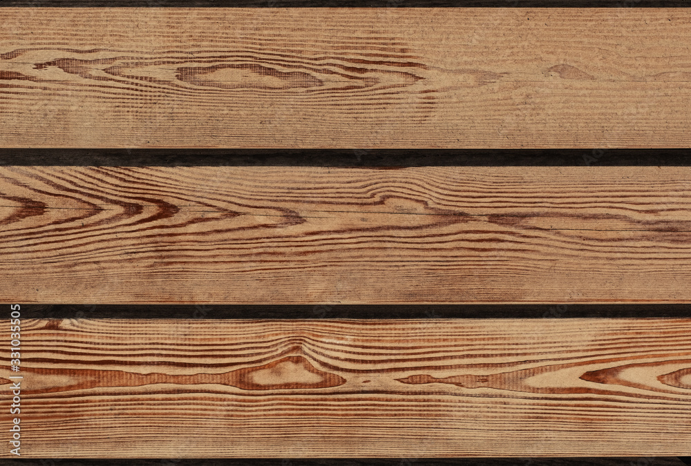 Background of boards close-up. Texture and pattern of old boards horizontal. Background of boards close-up. Texture and pattern of old boards horizontal.