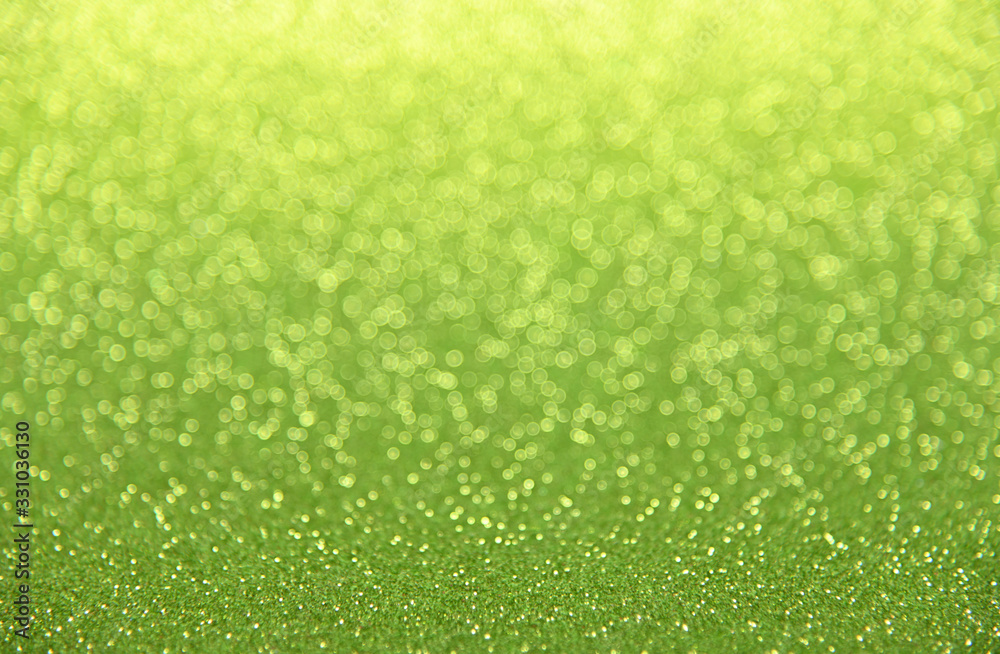 Abstract background of green bokeh lights