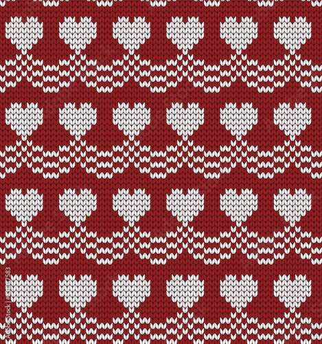 Knitted seamless decorative pattern hearts on red