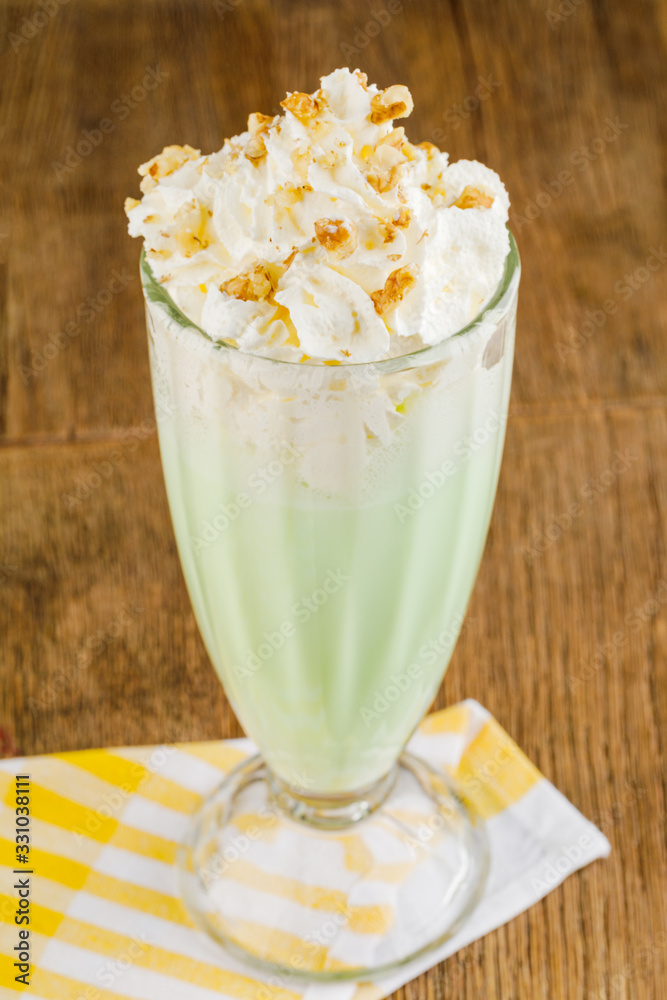 pistachio milkshake in glass cup pistachio milkshake in glass cup