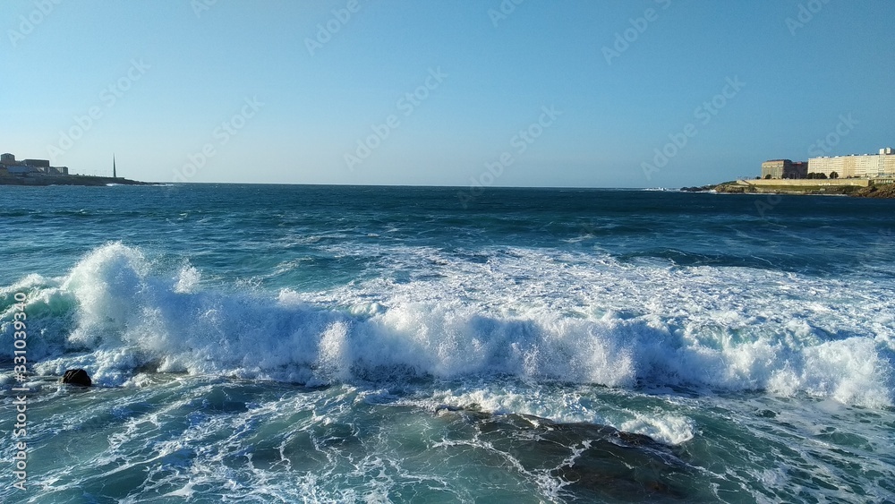 Waves on a beach in A coruna city in Spain