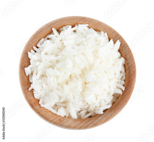 Wooden bowl with cooked rice isolated on white. top view