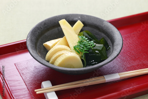 Wakatakeni, simmered young bamboo shoots with wakame seaweeds, traditional Japanese cuisine photo