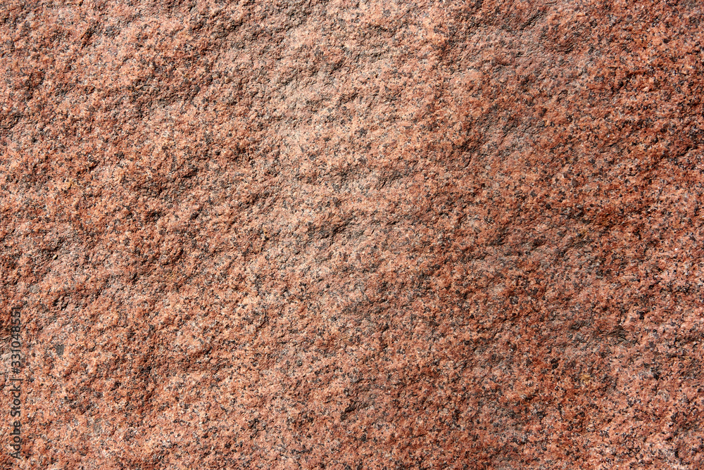 Horizontal brown-red stone texture for pattern and background. Closeup shot of stone rough wall. Horizontal brown-red stone texture for pattern and background. Closeup shot of stone rough wall.