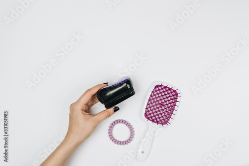 Hairdresser comb brush on white background  photo