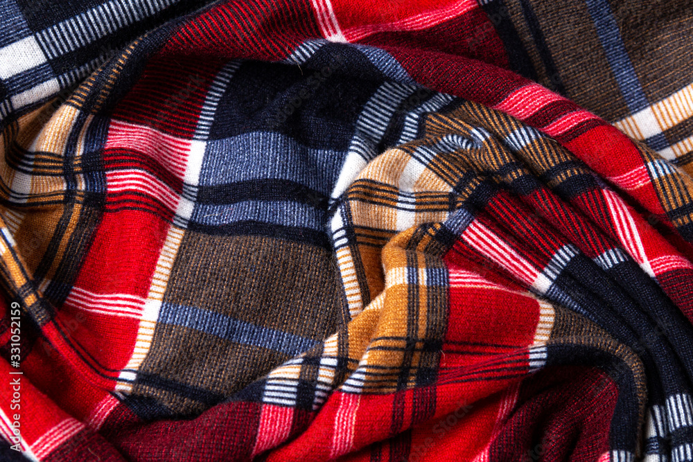 Wrinkled squared color fabric fragment. Background texture Wrinkled squared color fabric fragment. Background texture
