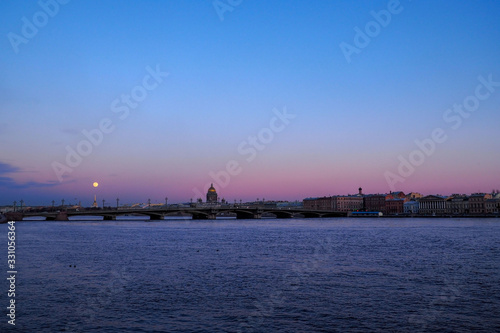 bridge over the river in the city at sunset © Zh.anna