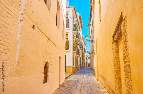 The narrow streets of Albaicin, Granada, Spain photo