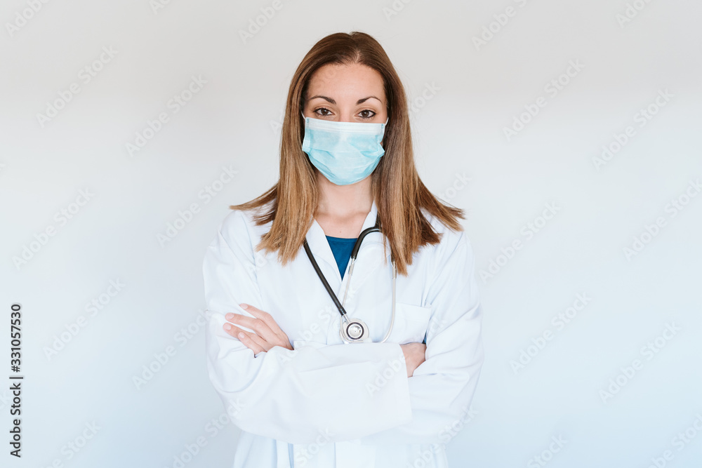 portrait of doctor woman wearing protective mask and gloves indoors. Corona virus concept portrait of doctor woman wearing protective mask and gloves indoors. Corona virus concept