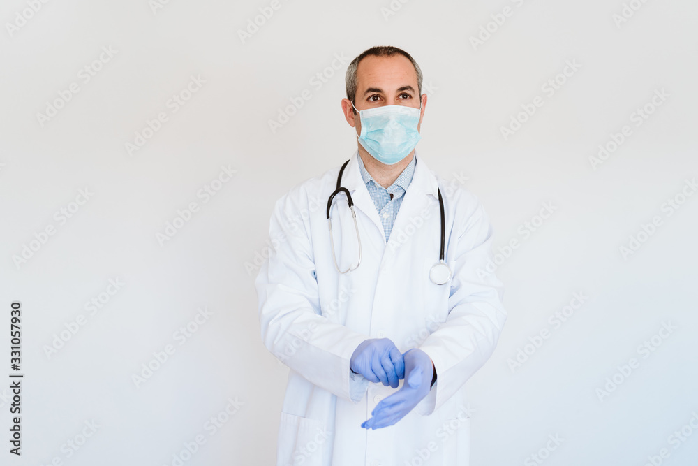 caucasian doctor using protective gloves and mask. Chinese Corona virus concept. 2019-nCoV