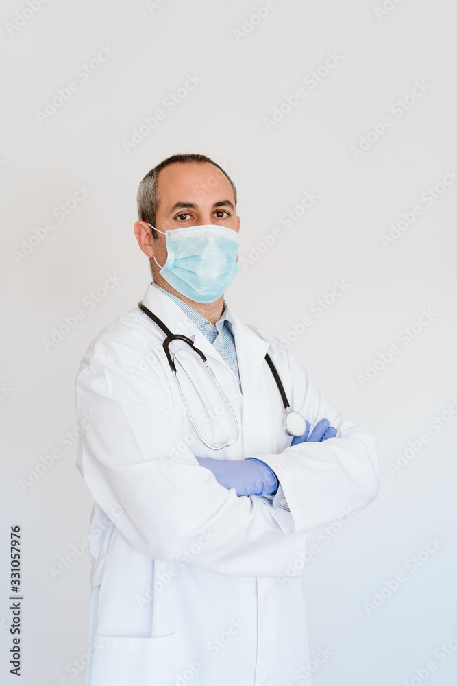 portrait of caucasian doctor using protective gloves and mask. Chinese Corona virus concept. 2019-nCoV portrait of caucasian doctor using protective gloves and mask. Chinese Corona virus concept. 2019-nCoV