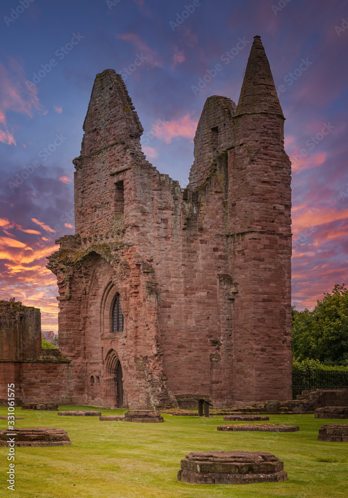 Ancient Ruins of Arbroath Abbey at Sunset in Scotland