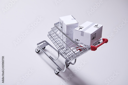 shopping trolley with boxes, shopping concept