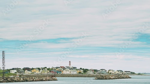 Alnesgard, Godoya, Norway. Old Alnes Lighthouse In Summer Day In Godoy Island Near Alesund Town. Alnes Fyr photo