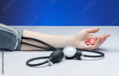 tonometer measures the pressure of woman a doctor appointment