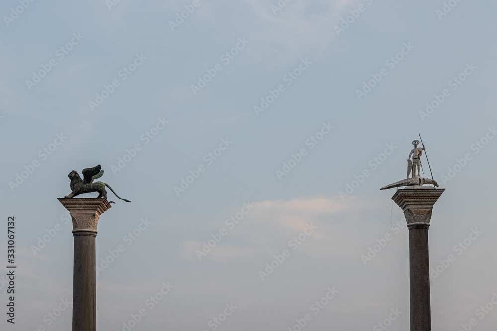 Two sculptures on pillars