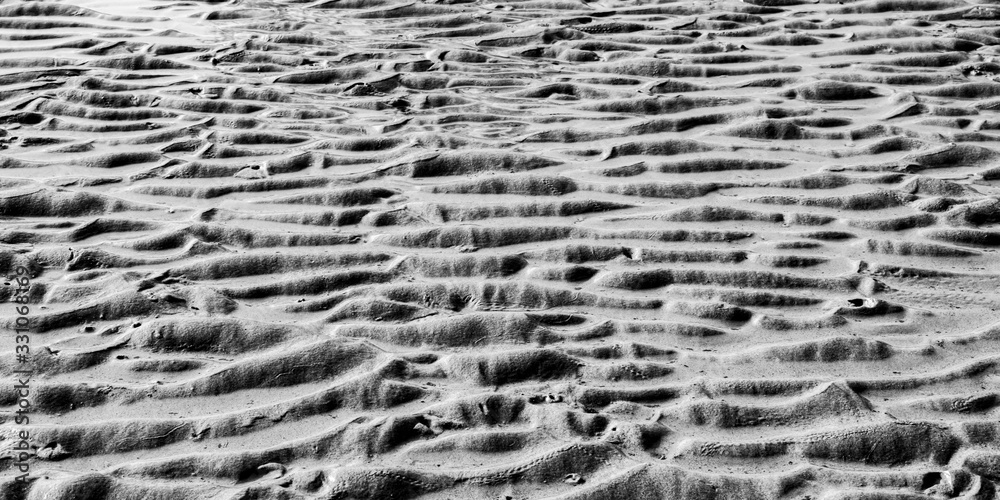 Sand dunes on the beach after low tide Sand dunes on the beach after low tide