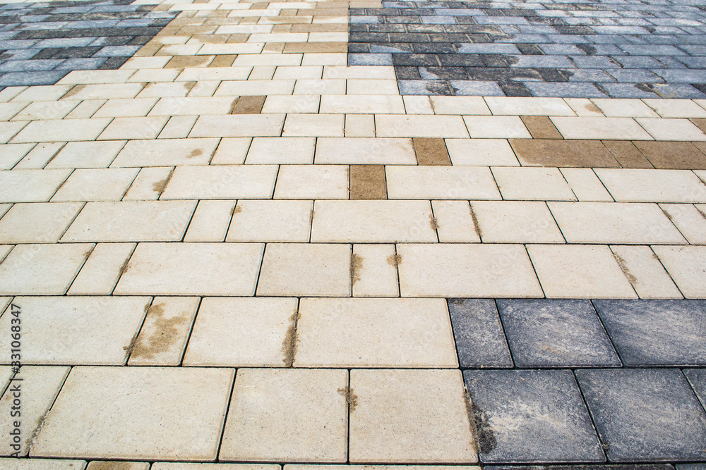 Fototapeta premium paving slabs after rain, urban background