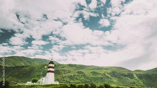 Alnesgard, Godoya, Norway. Old Alnes Lighthouse In Summer Day In Godoy Island Near Alesund Town. Alnes Fyr photo