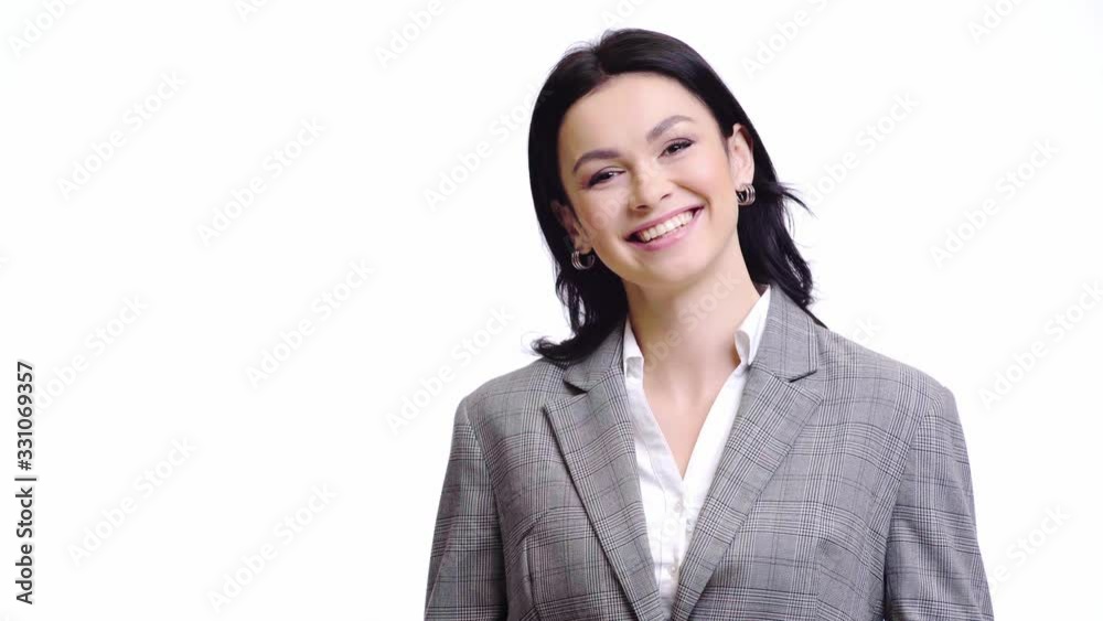 Businesswoman laughing and looking at camera isolated on white Businesswoman laughing and looking at camera isolated on white