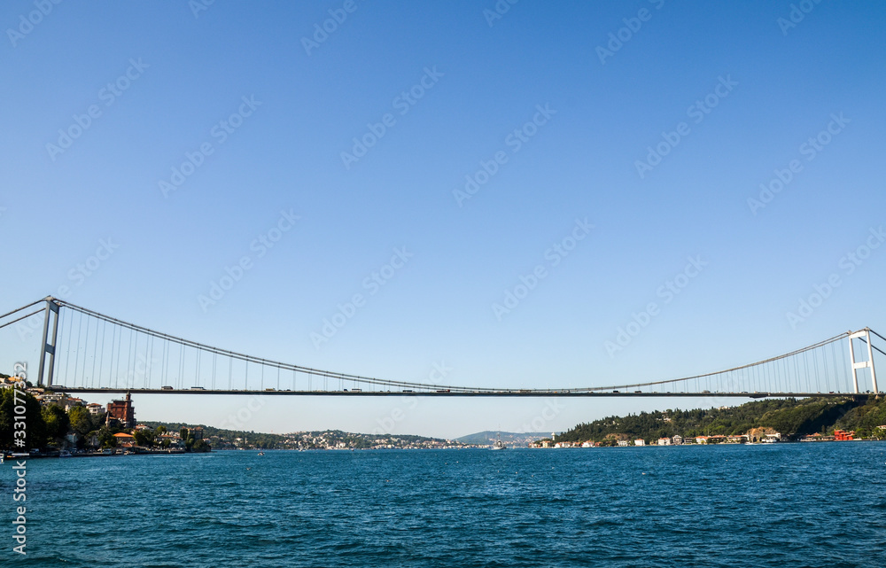 Fatih Sultan Mehmet Bridge also known as the Second Bosphorus Bridge over mansions on the Bosphorus Strait at Rumeli Hisari Istanbul Turkey