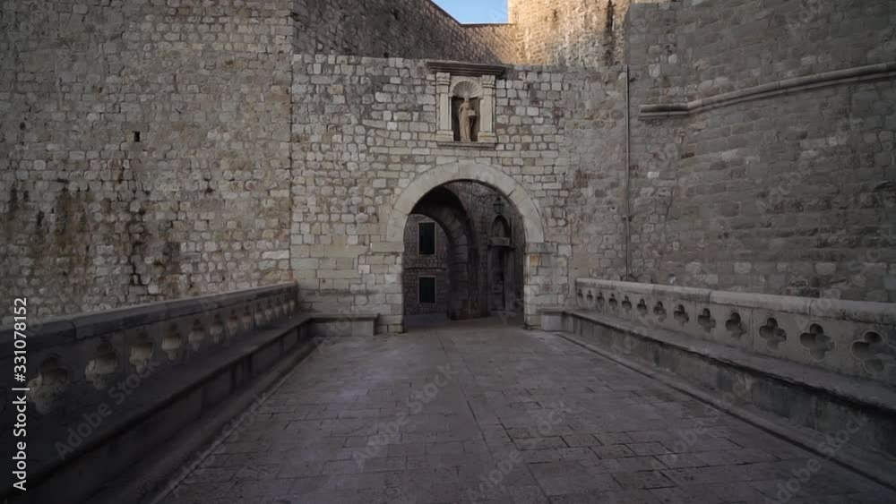 Fortress Gate, Dubrovnik Old Town, Croatia. location for Game of Thrones. Historic tourism & major tourist attraction in Mediterranean Europe in summer. Fortress Gate, Dubrovnik Old Town, Croatia. location for Game of Thrones. Historic tourism & major tourist attraction in Mediterranean Europe in summer.