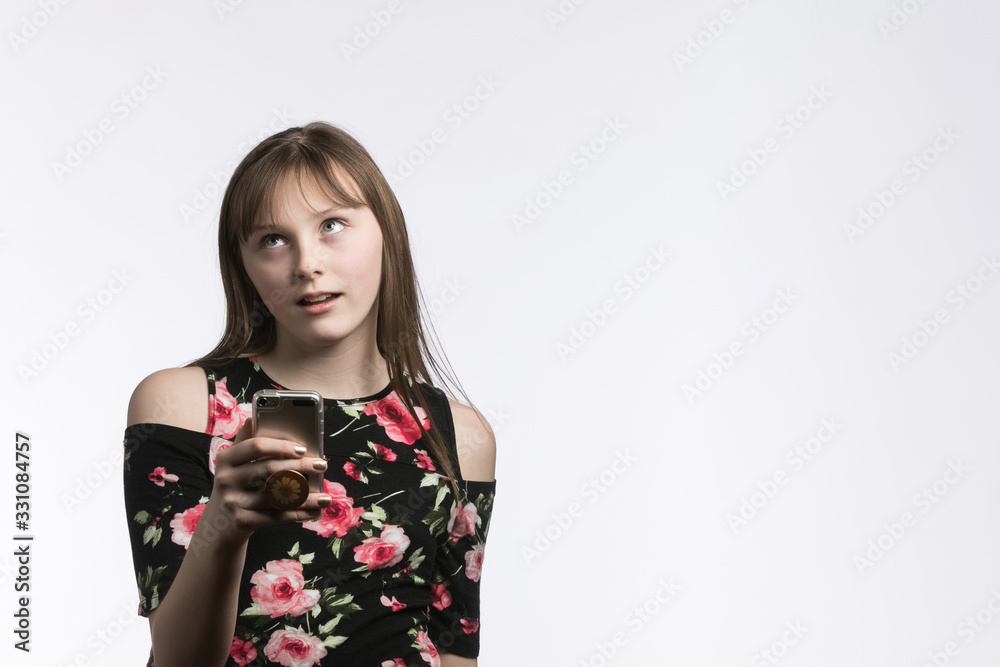 Eye-rolling pre-teen giving attitude on white background Eye-rolling pre-teen giving attitude on white background