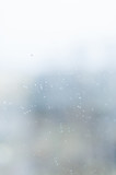 Texture. Foggy window with flowing water droplets. Can be used as a background.