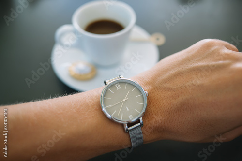 Slika na platnu Selective focus of modern elegant designed silver wrist watch with minimalistic